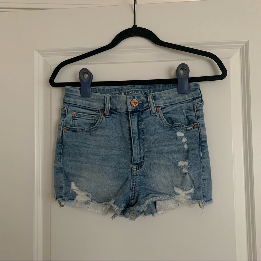 American Eagle, distressed medium-light was denim jean shorts, size 4